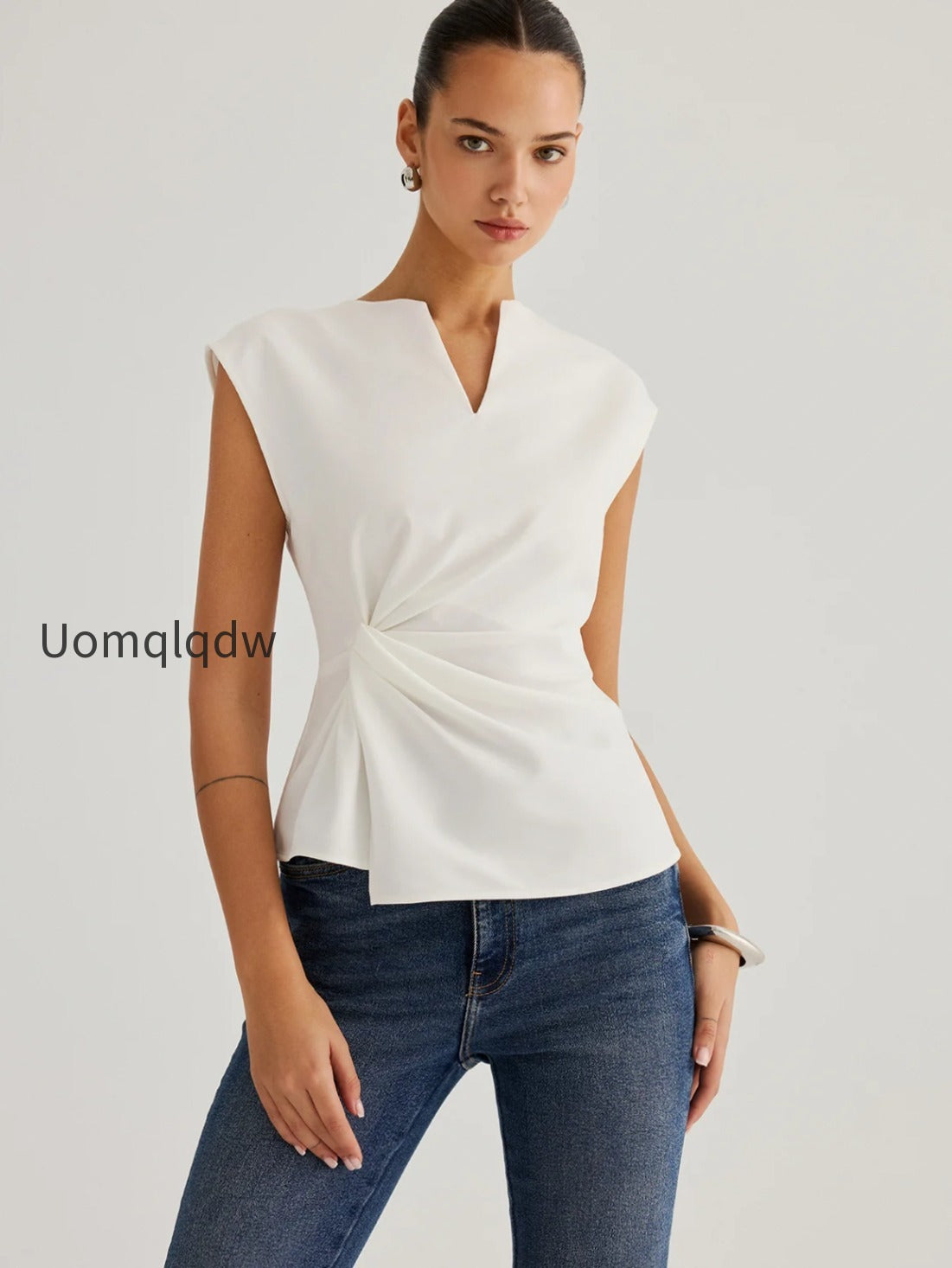 sleeveless-twisted-waist-blouse