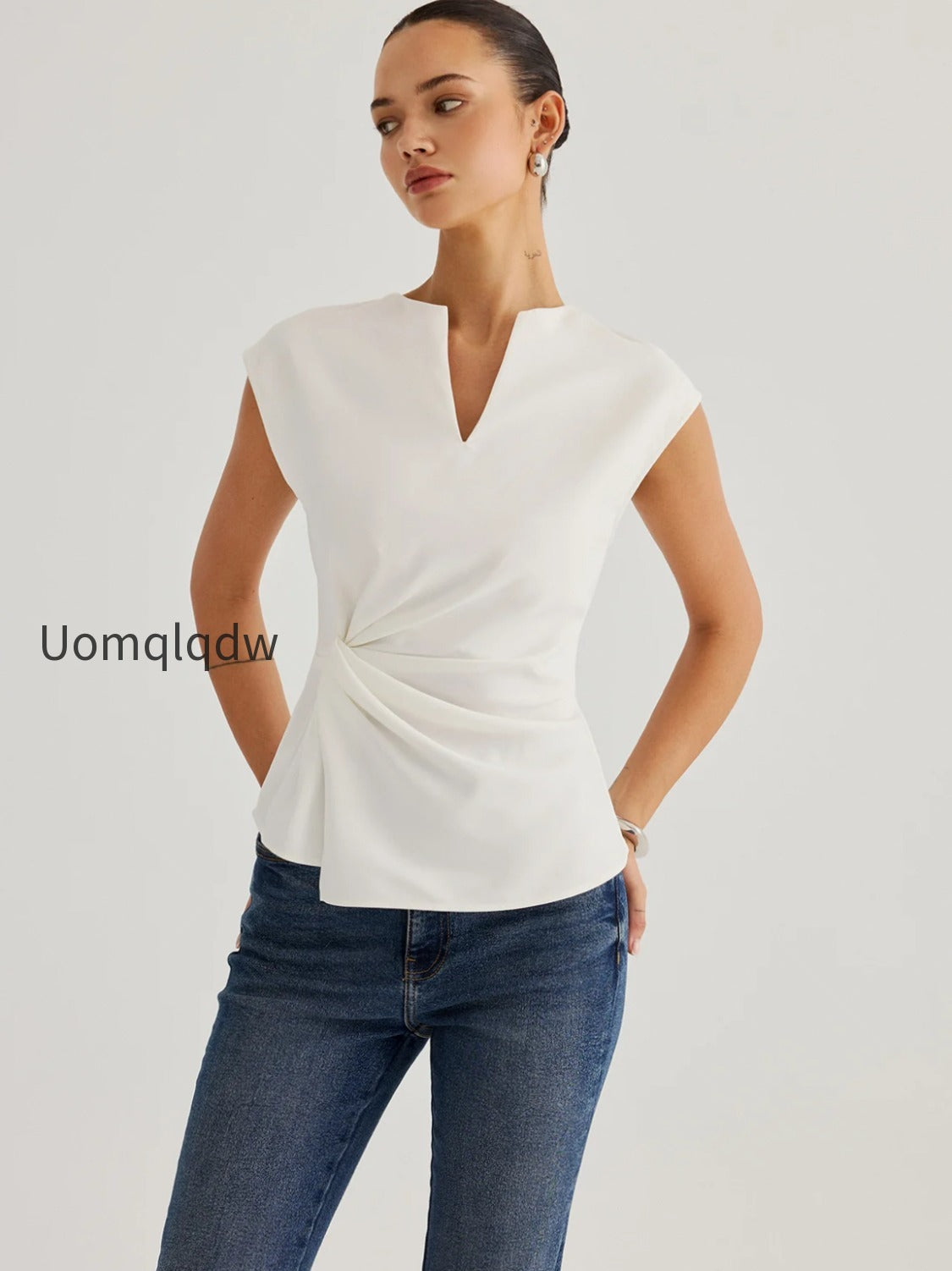 sleeveless-twisted-waist-blouse